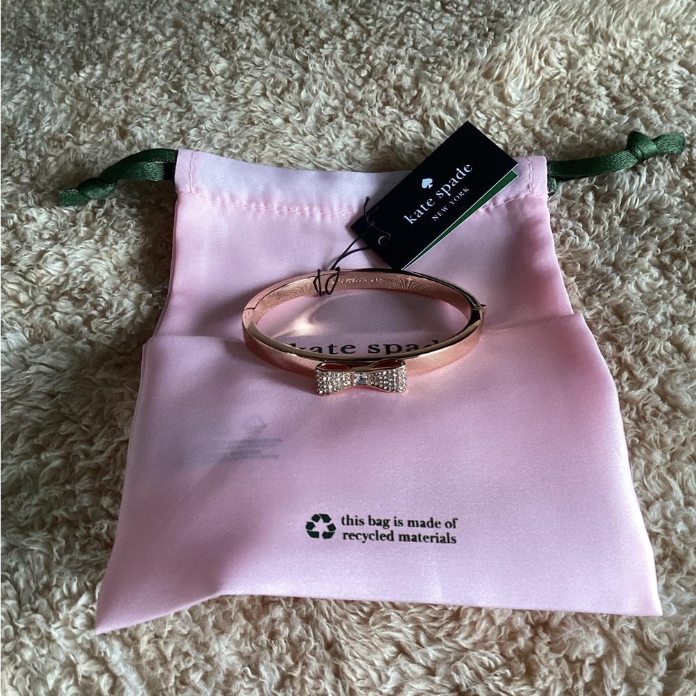 KATE SPADE BANGLE BRACELET. ROSE GOLD W/PAVE CZ STONES